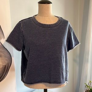 Crop short sleeve sweatshirt with rolled seam detail.